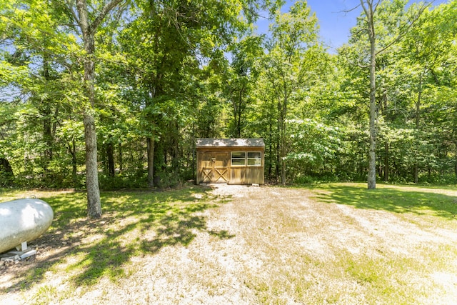 29474 Farm Rd Unit 1260, Golden, MO 65658 - view of grassy yard featuring a storage unit