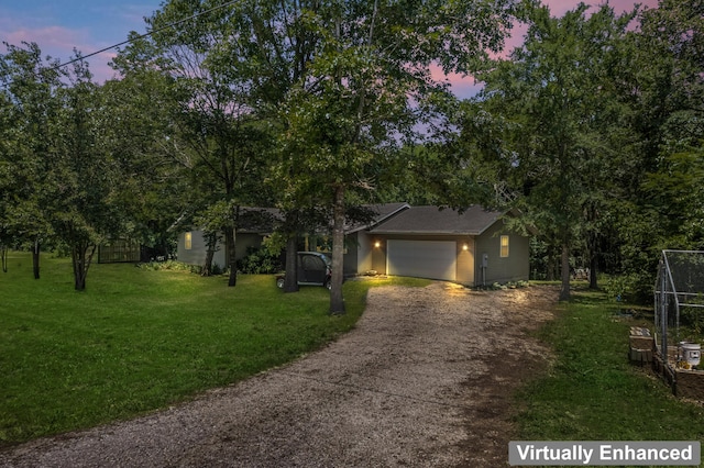 29474 Farm Rd Unit 1260, Golden, MO 65658 - view of front facade with driveway, an attached garage, and a front lawn