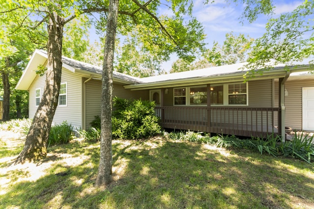 29474 Farm Rd Unit 1260, Golden, MO 65658 - view of front of house with an attached garage and a front yard
