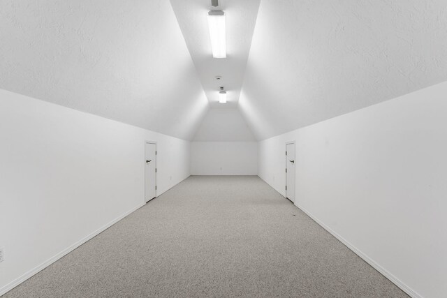 4156 E Division St, Springfield, MO 65802 - bonus room featuring lofted ceiling and carpet