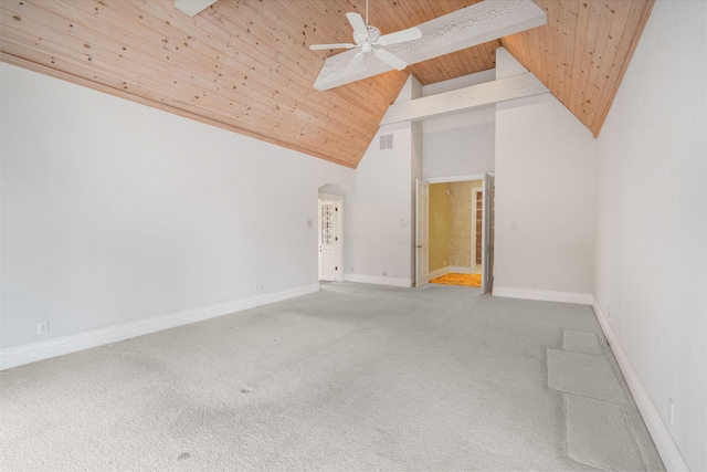 4156 E Division St, Springfield, MO 65802 - unfurnished living room with a wood ceiling with exposed beams, a ceiling fan, arched walkways, carpet flooring, and high vaulted ceiling