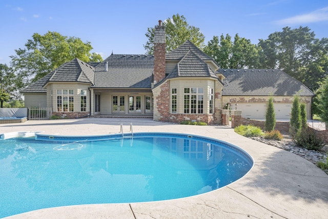 4156 E Division St, Springfield, MO 65802 - outdoor pool featuring french doors