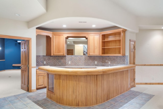 4156 E Division St, Springfield, MO 65802 - kitchen featuring backsplash, light countertops, recessed lighting, light colored carpet, and open shelves