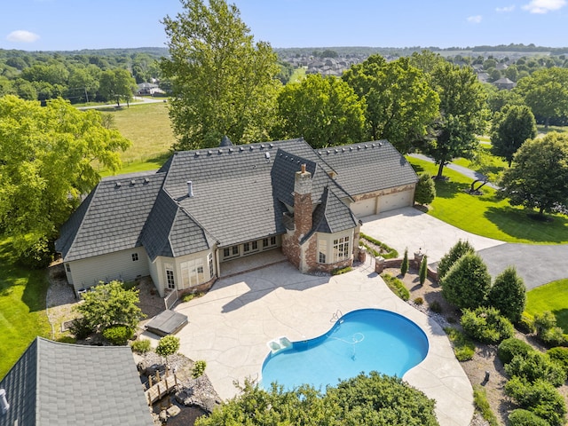 4156 E Division St, Springfield, MO 65802 - outdoor pool featuring a patio