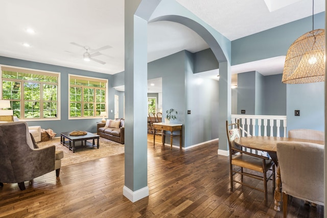 2504 W Fox Fire Ct, Nixa, MO 65714 - dining area with wood-type flooring, a ceiling fan, plenty of natural light, arched walkways, and recessed lighting