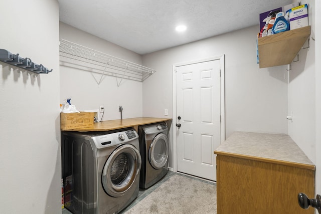 2504 W Fox Fire Ct, Nixa, MO 65714 - laundry room featuring washer and clothes dryer and light colored carpet