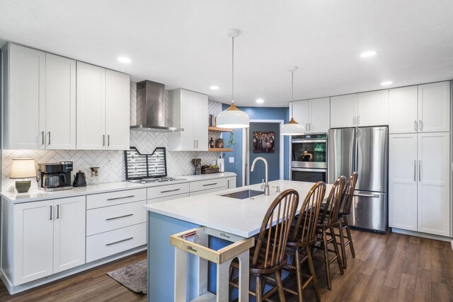 2504 W Fox Fire Ct, Nixa, MO 65714 - kitchen with stainless steel appliances, wall chimney range hood, light countertops, backsplash, and open shelves