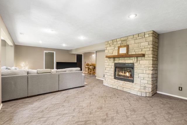 2504 W Fox Fire Ct, Nixa, MO 65714 - living room with carpet flooring, a fireplace, and recessed lighting