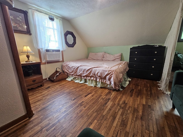 312 W Locust St, Aurora, MO 65605 - bedroom featuring wood-type flooring, a textured ceiling, cooling unit, and vaulted ceiling