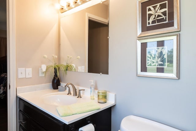 249 State Highway 73, Macks Creek, MO 65786 - bathroom featuring vanity and toilet