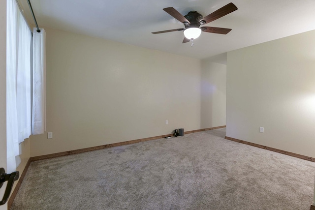 18054 State Highway 39, Aurora, MO 65605 - spare room featuring carpet and ceiling fan