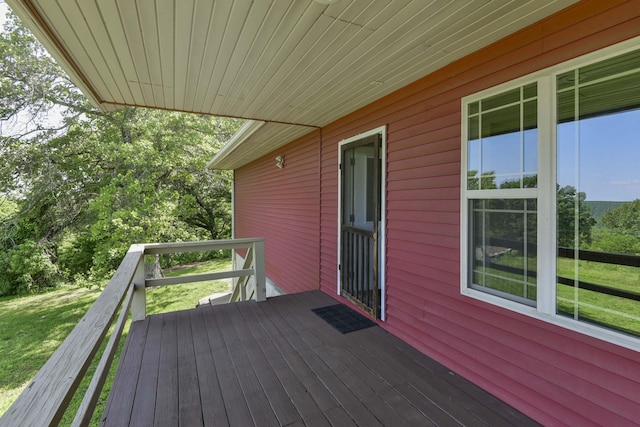18054 State Highway 39, Aurora, MO 65605 - wooden deck with a lawn