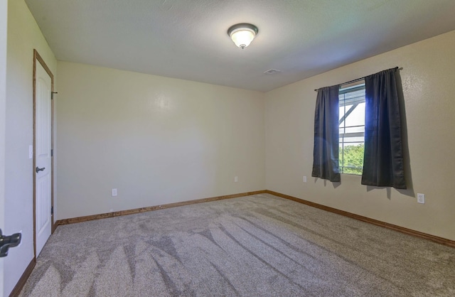 18054 State Highway 39, Aurora, MO 65605 - unfurnished room with carpet floors and baseboards