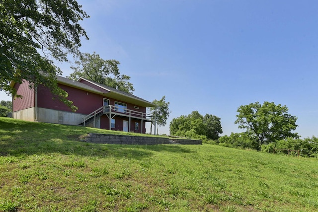 18054 State Highway 39, Aurora, MO 65605 - view of grassy yard with a deck