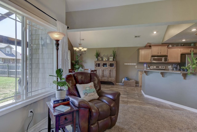 105 Deer Run, Willard, MO 65781 - living room with plenty of natural light, a chandelier, light tile patterned floors, and lofted ceiling