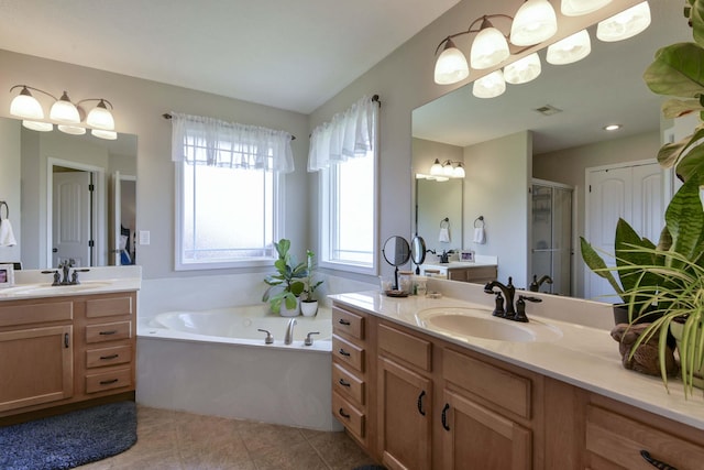 105 Deer Run, Willard, MO 65781 - bathroom with a stall shower, a bath, tile patterned floors, and two vanities