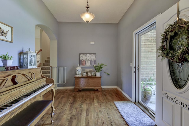105 Deer Run, Willard, MO 65781 - entryway with wood finished floors, arched walkways, and stairway