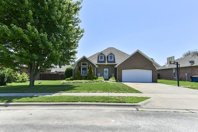105 Deer Run, Willard, MO 65781 - view of front of house with an attached garage, concrete driveway, and brick siding