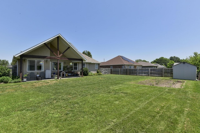 105 Deer Run, Willard, MO 65781 - rear view of house featuring a fenced backyard, a storage shed, and a patio area