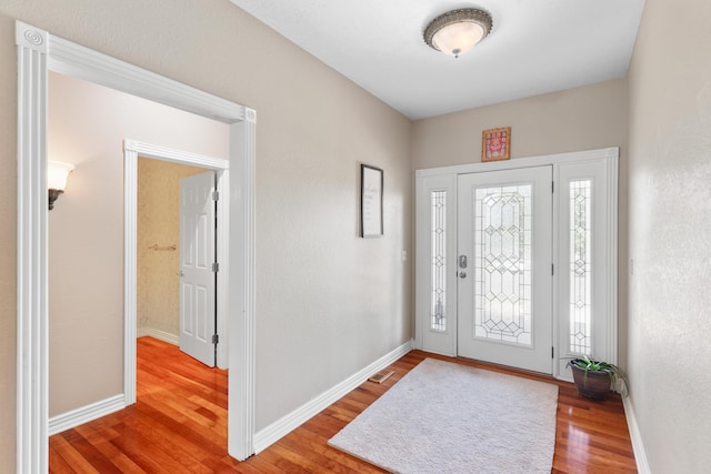 3702 E Dartmoor Ct, Springfield, MO 65802 - foyer entrance featuring wood finished floors and baseboards