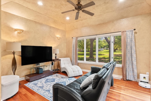 3702 E Dartmoor Ct, Springfield, MO 65802 - living area with wood finished floors, ceiling fan, recessed lighting, and a textured wall