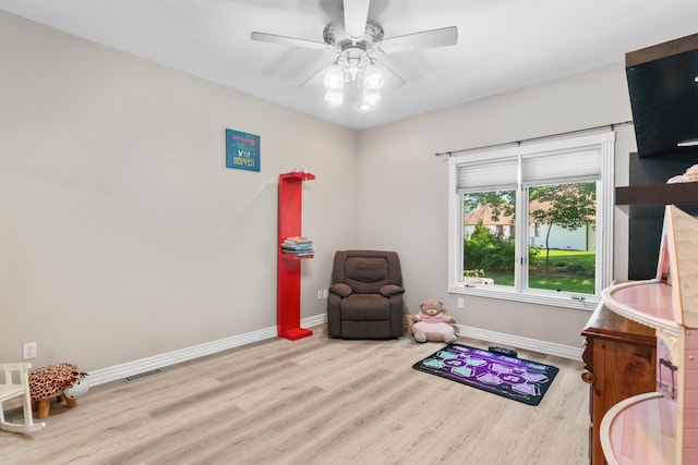 3702 E Dartmoor Ct, Springfield, MO 65802 - living area with wood finished floors and a ceiling fan