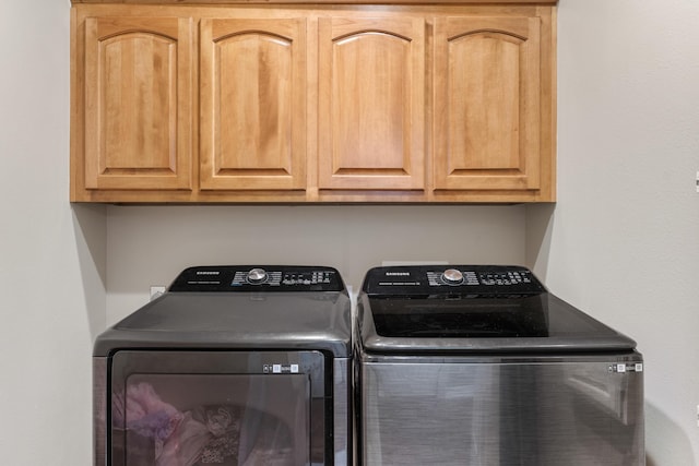 3702 E Dartmoor Ct, Springfield, MO 65802 - laundry room with washing machine and dryer and cabinet space