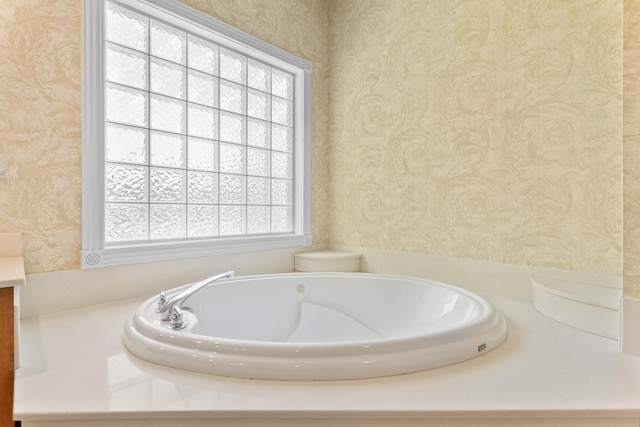 3702 E Dartmoor Ct, Springfield, MO 65802 - full bath with wallpapered walls, a garden tub, and vanity
