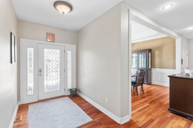 3702 E Dartmoor Ct, Springfield, MO 65802 - entrance foyer featuring light wood-type flooring and a wainscoted wall