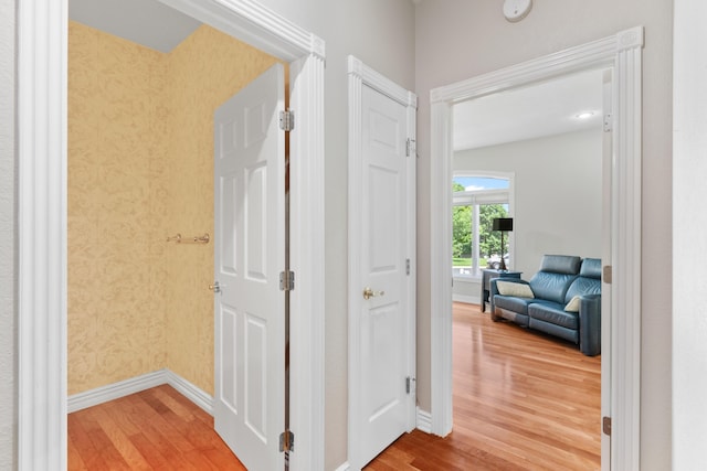 3702 E Dartmoor Ct, Springfield, MO 65802 - corridor featuring wood finished floors and wallpapered walls