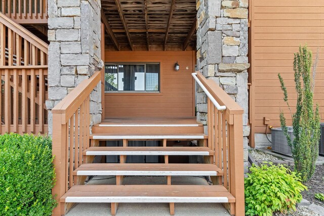 161 Avondale Dr Unit 1, Branson, MO 65616 - view of exterior entry featuring stone siding