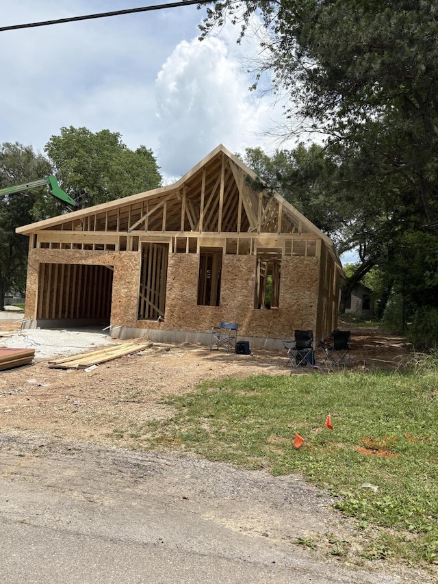 386 S Ave, Sparta, MO 65753 - property in mid-construction featuring a garage