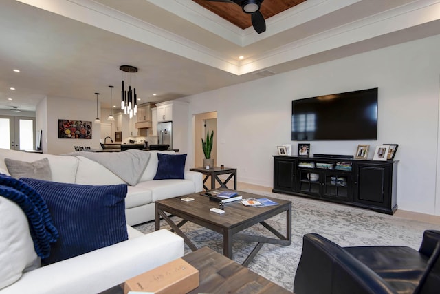 3733 E Hutcheson Ave, Springfield, MO 65802 - living area with a ceiling fan, a tray ceiling, and recessed lighting