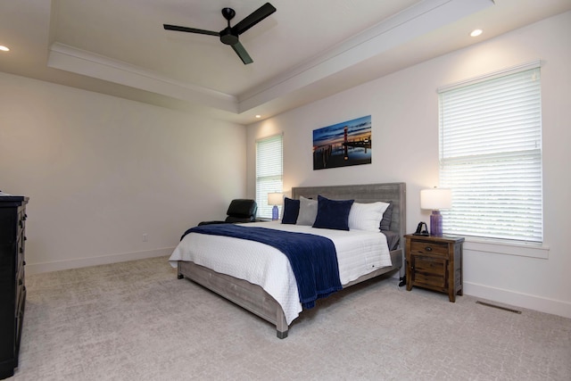 3733 E Hutcheson Ave, Springfield, MO 65802 - bedroom featuring light colored carpet, a tray ceiling, recessed lighting, and a ceiling fan