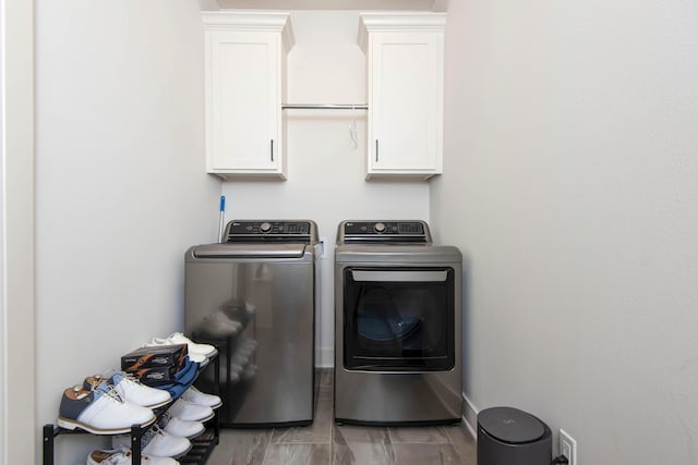 3733 E Hutcheson Ave, Springfield, MO 65802 - washroom with washer and clothes dryer and cabinet space