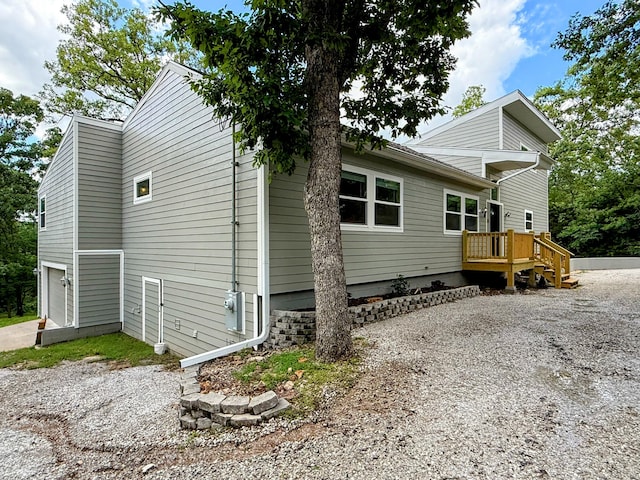 48 Galatians Ln, Reeds Spring, MO 65737 - view of side of home with an attached garage