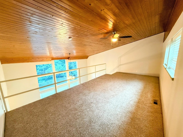 48 Galatians Ln, Reeds Spring, MO 65737 - unfurnished room with healthy amount of natural light, wooden ceiling, ceiling fan, and carpet