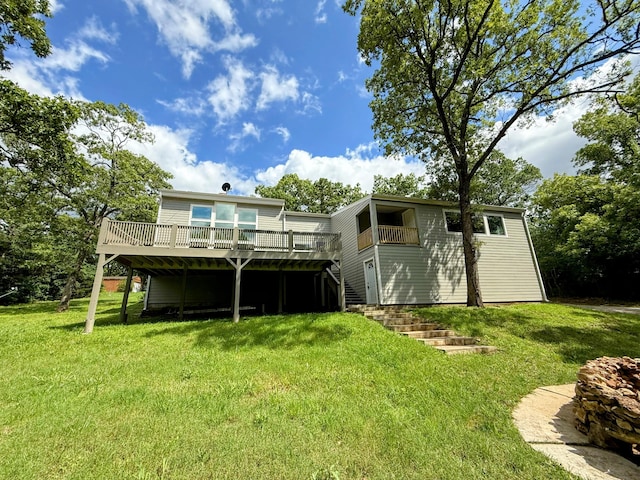 48 Galatians Ln, Reeds Spring, MO 65737 - back of property featuring a wooden deck and a lawn