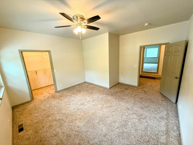 48 Galatians Ln, Reeds Spring, MO 65737 - empty room with ceiling fan and light colored carpet