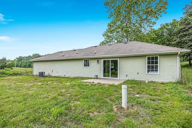 3936 S 77th Rd, Dunnegan, MO 65640 - rear view of property with a patio and a lawn