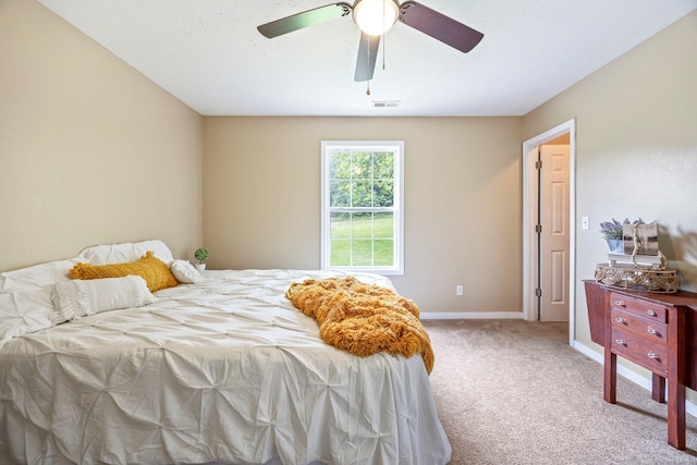 3936 S 77th Rd, Dunnegan, MO 65640 - carpeted bedroom featuring baseboards and a ceiling fan