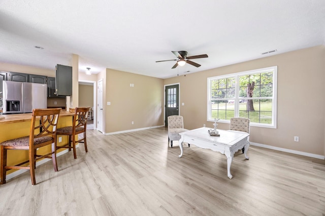 3936 S 77th Rd, Dunnegan, MO 65640 - dining room featuring light wood-style flooring and a ceiling fan