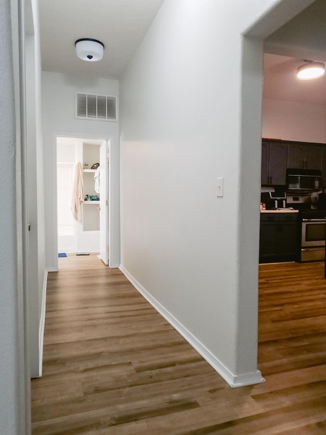1305 N Main Ave, Springfield, MO 65802 - hall featuring wood finished floors