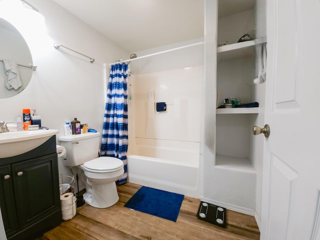 1305 N Main Ave, Springfield, MO 65802 - full bathroom with vanity, shower / bath combo with shower curtain, and wood finished floors