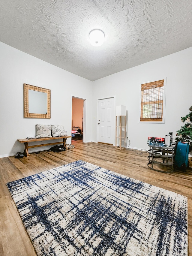 1305 N Main Ave, Springfield, MO 65802 - sitting room featuring wood finished floors and a textured ceiling