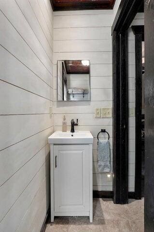 31 Mulberry Ln, Buffalo, MO 65622 - bathroom with vanity and wood walls
