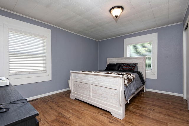 2718 E Blaine St, Springfield, MO 65803 - bedroom featuring crown molding and wood finished floors