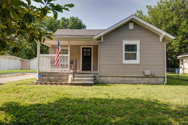 2718 E Blaine St, Springfield, MO 65803 - view of front of home featuring a porch, driveway, and a shingled roof