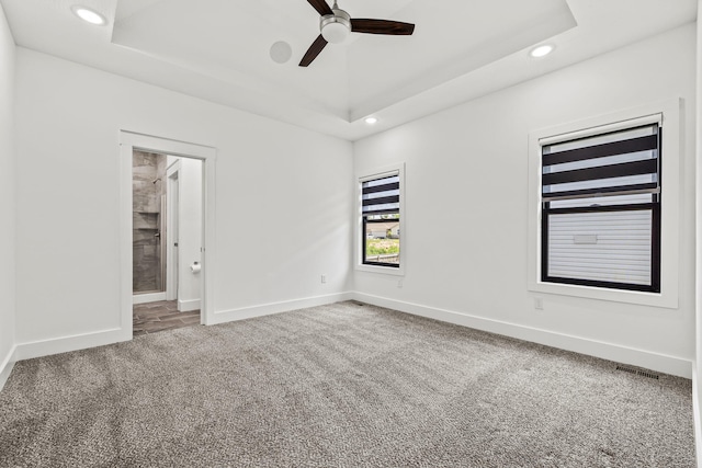 1305 W Ragweed Ct, Ozark, MO 65721 - empty room with carpet, recessed lighting, a ceiling fan, and a tray ceiling