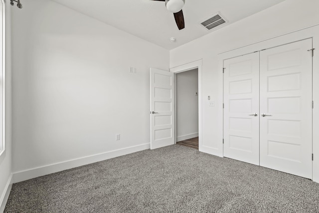 1305 W Ragweed Ct, Ozark, MO 65721 - unfurnished bedroom featuring carpet, a closet, and ceiling fan